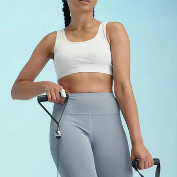 Bluetooth ring tracker worn with black strap and silver pendant ball attached