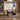 Workout machine with touchscreen; user performs overhead cable press while lying