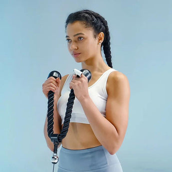 Bluetooth ring tracker with black rope strap and silver pendant ball on hand